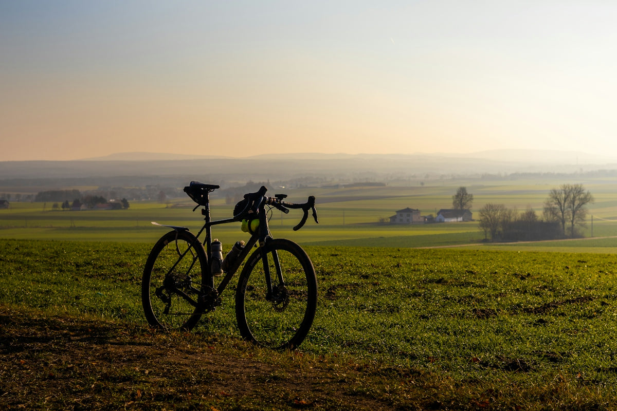 A bike is parked on the side of a hill