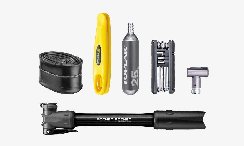 Bidón portaherramientas Topeak Escape Pod L negro – ejemplo de contenido talla L