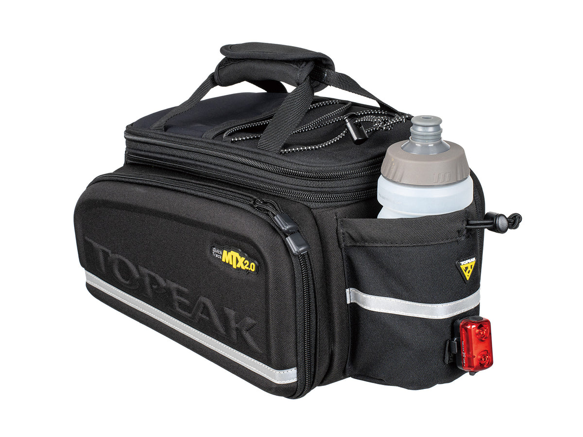 Bolsa de portabultos Topeak MTX TrunkBag DXP negro – vista trasera con portabidón y clip de luz